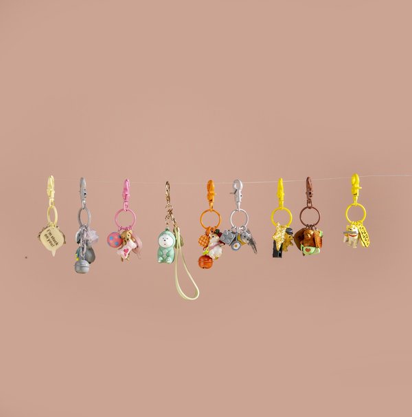 Unlock joy: shop our charming collection of colorful charms!
